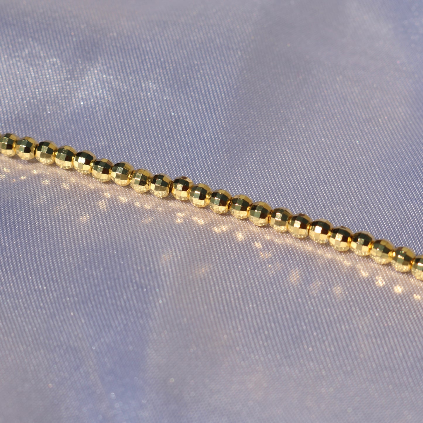 Astro Glimmer Bead Bracelet