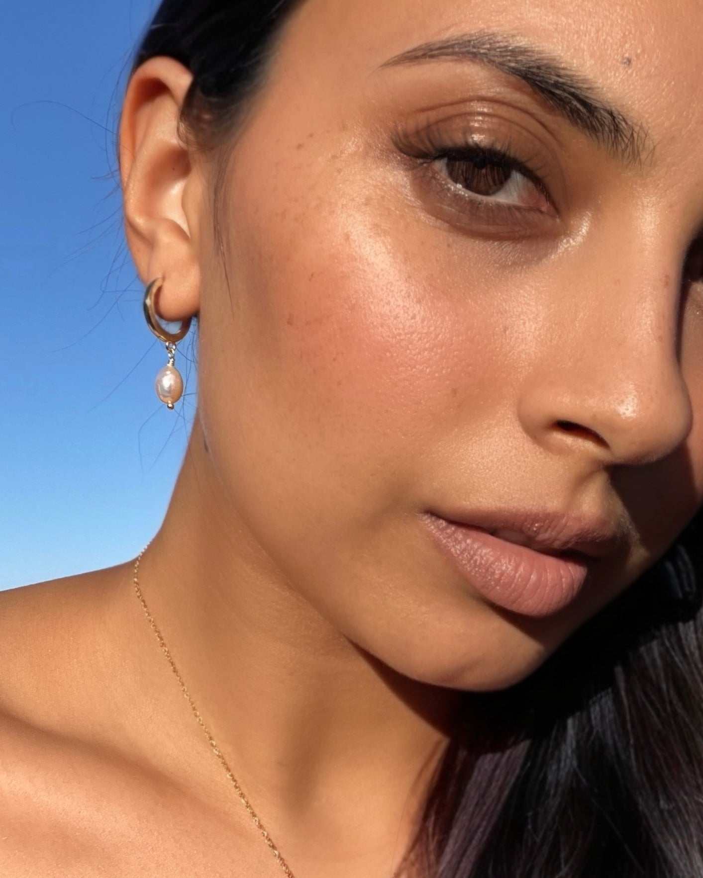 Sol Pearl Huggie Earrings